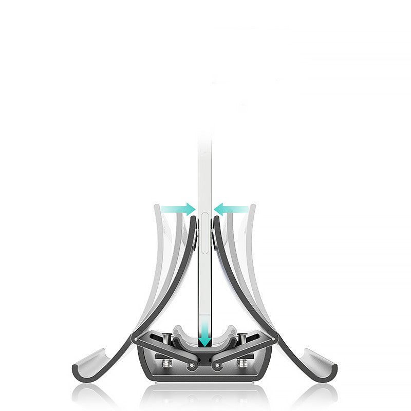 Aluminium gravity laptop stand holding MacBook on desk with keyboard and mouse setup