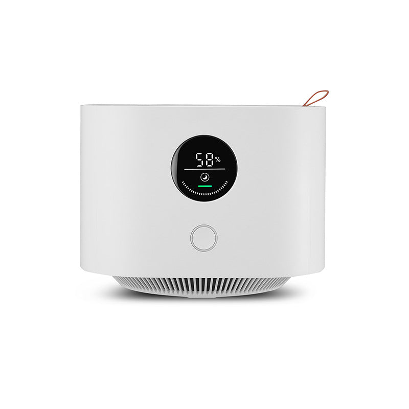 Smitech Pure-Zone air purifier on office desk next to laptop and monitor setup