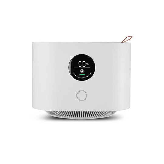 Smitech Pure-Zone air purifier on office desk next to laptop and monitor setup