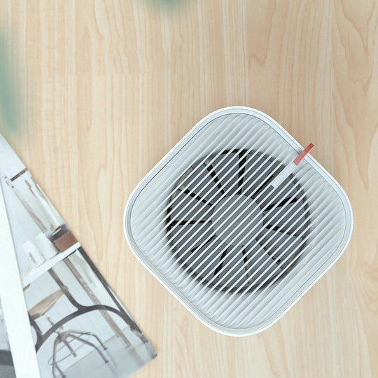 Smitech air purifier side view showing H13 HEPA filter layers and clean design