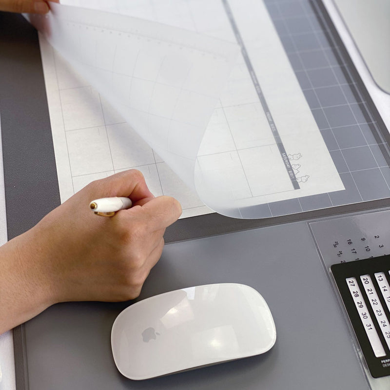 Waterproof desk pad protector for office desk surface with non-slip base and clean minimal design
