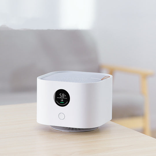 Compact desk air purifier with smart sensor and USB power for workspace use